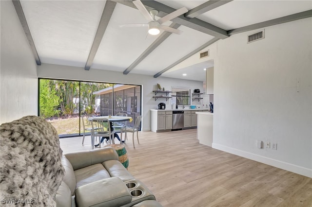 2226 SE 19th Pl, Cape Coral, FL 33990 - living room featuring baseboards, light wood-type flooring, lofted ceiling with beams, and visible vents