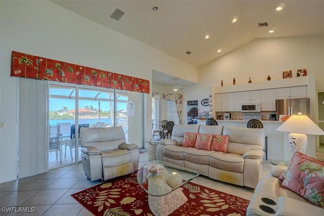 330 SW 33rd Ave, Cape Coral, FL 33991 - living room with light tile patterned floors, visible vents, recessed lighting, a ceiling fan, and high vaulted ceiling