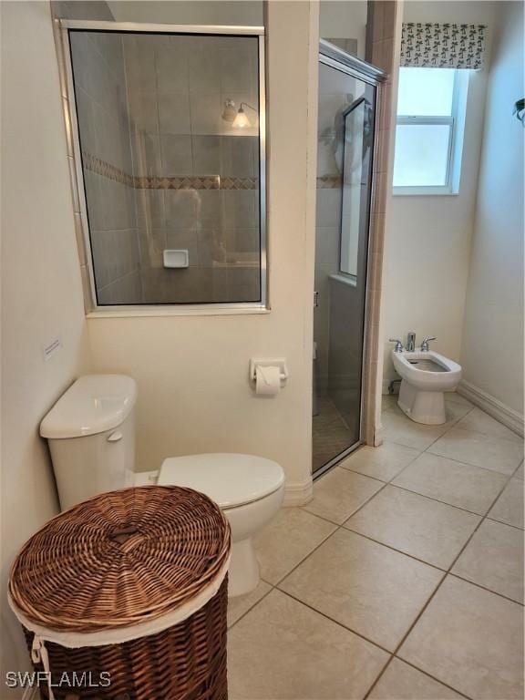 330 SW 33rd Ave, Cape Coral, FL 33991 - full bath with a stall shower, baseboards, toilet, a bidet, and tile patterned floors