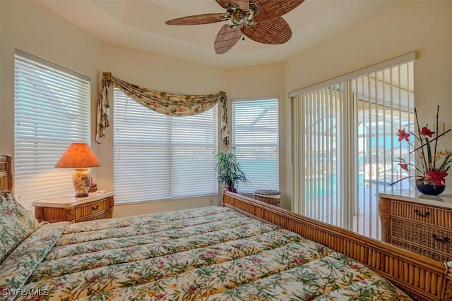 330 SW 33rd Ave, Cape Coral, FL 33991 - bedroom featuring ceiling fan and access to outside