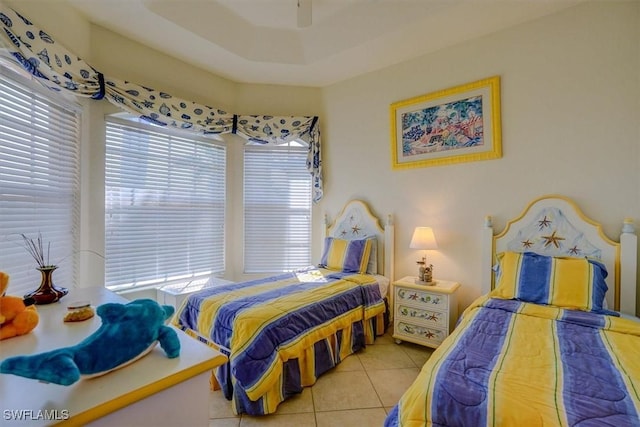 330 SW 33rd Ave, Cape Coral, FL 33991 - bedroom featuring tile patterned floors, a ceiling fan, and multiple windows