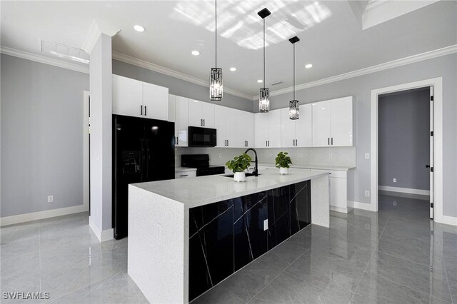 1042 Bassinger Ave S, Lehigh Acres, FL 33974 - kitchen with ornamental molding, white cabinets, black appliances, marble finish floor, and a sink