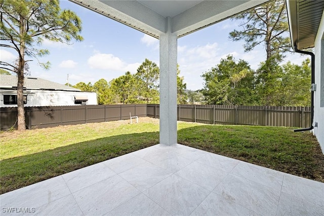 1042 Bassinger Ave S, Lehigh Acres, FL 33974 - view of patio with a fenced backyard