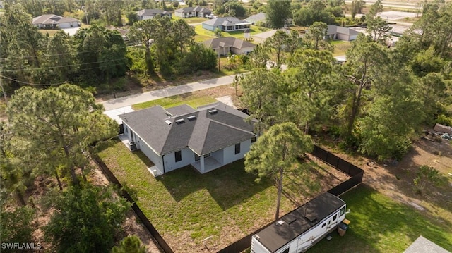 1042 Bassinger Ave S, Lehigh Acres, FL 33974 - drone / aerial view