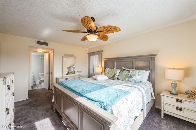 bedroom featuring dark carpet, a textured ceiling, ceiling fan, and baseboards