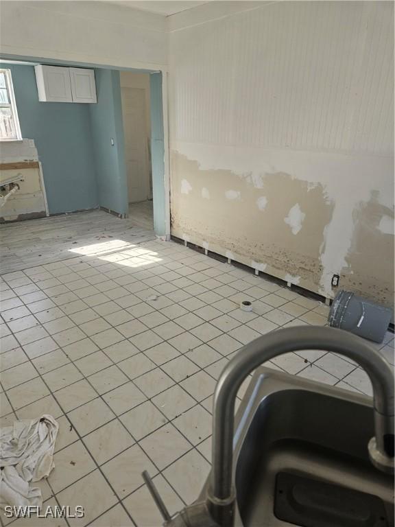 2631 Becca Ave, Naples, FL 34112 - unfurnished room featuring light tile patterned flooring