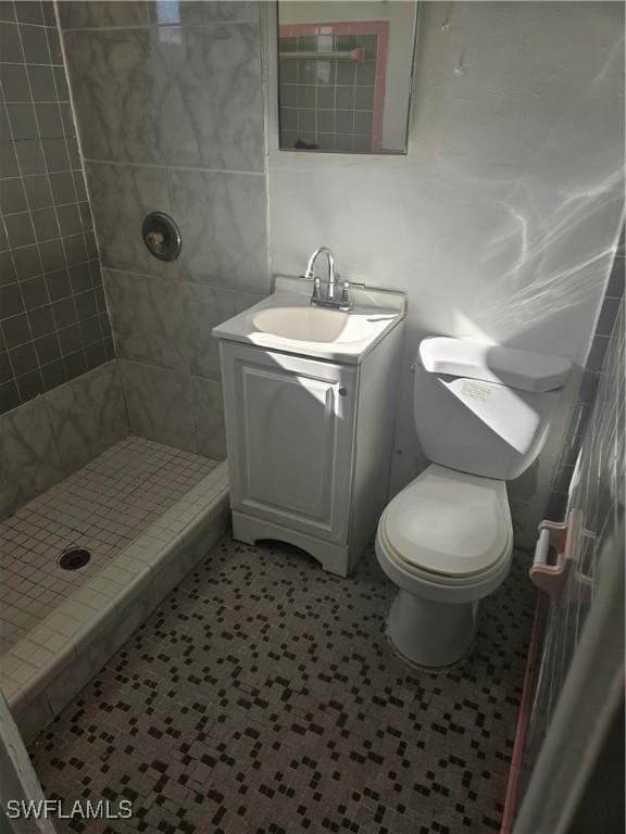2631 Becca Ave, Naples, FL 34112 - full bathroom with toilet, a stall shower, and vanity