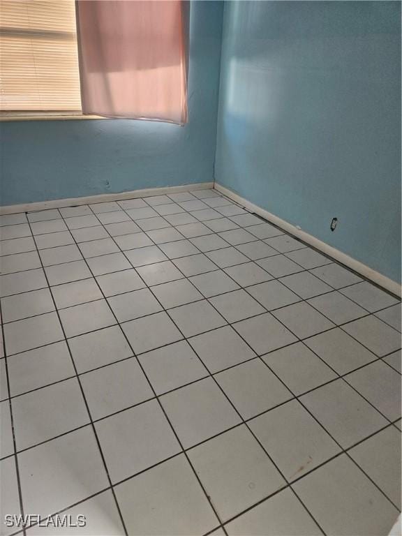 2631 Becca Ave, Naples, FL 34112 - spare room featuring baseboards