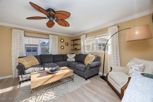 780 10th Ave S Unit 24, Naples, FL 34102 - living area with healthy amount of natural light, ceiling fan, crown molding, wood finished floors, and baseboards