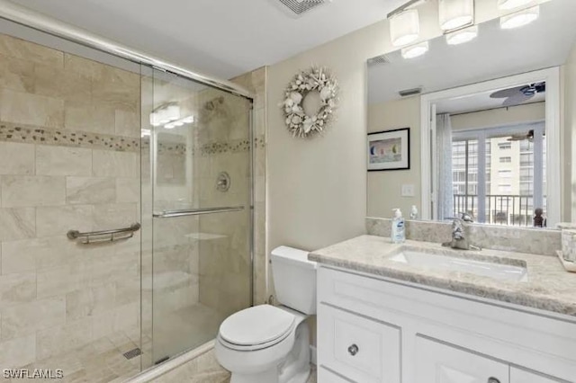 4361 Bay Beach Ln Unit 224, Fort Myers Beach, FL 33931 - full bath featuring visible vents, a stall shower, toilet, and vanity
