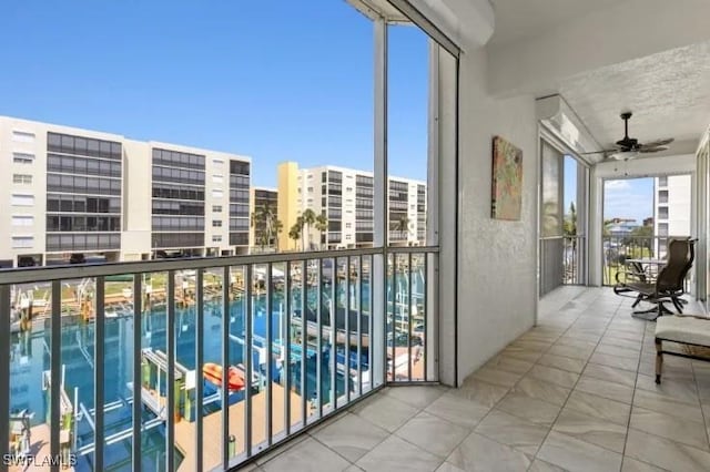 4361 Bay Beach Ln Unit 224, Fort Myers Beach, FL 33931 - balcony featuring a city view and ceiling fan