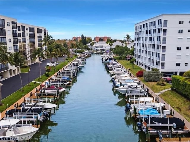 4361 Bay Beach Ln Unit 224, Fort Myers Beach, FL 33931 - dock area with boat lift and a water view