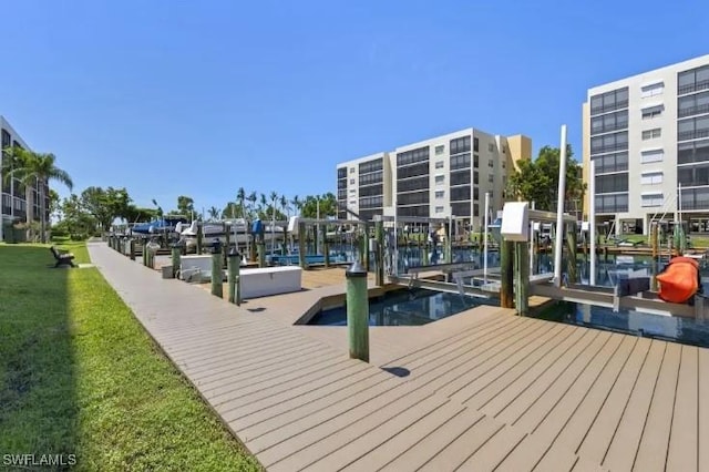4361 Bay Beach Ln Unit 224, Fort Myers Beach, FL 33931 - dock area with boat lift