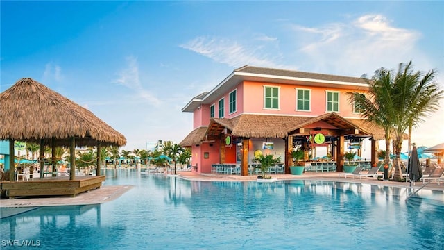 4361 Bay Beach Ln Unit 224, Fort Myers Beach, FL 33931 - community pool featuring a gazebo and a patio