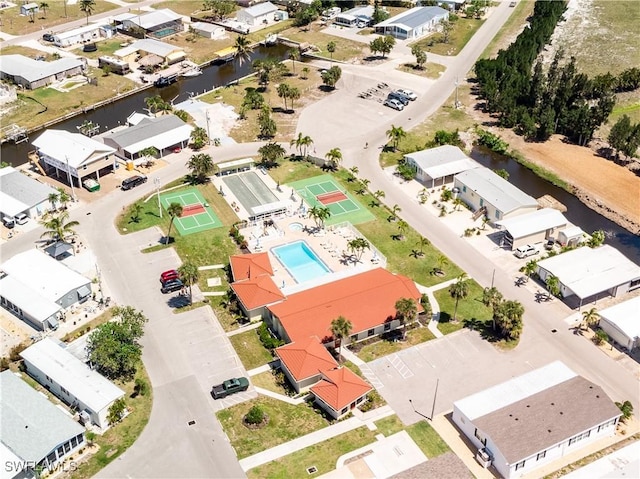 aerial view with a water view and a residential view