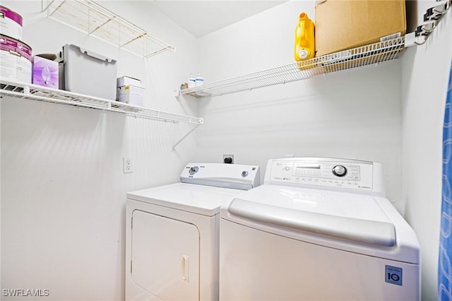 6081 Waterway Bay Dr, Fort Myers, FL 33908 - laundry room featuring laundry area and independent washer and dryer