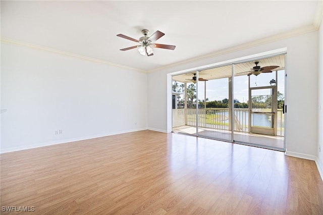6081 Waterway Bay Dr, Fort Myers, FL 33908 - unfurnished room with crown molding, a ceiling fan, and wood finished floors