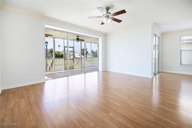 6081 Waterway Bay Dr, Fort Myers, FL 33908 - unfurnished room with a ceiling fan, wood finished floors, and crown molding