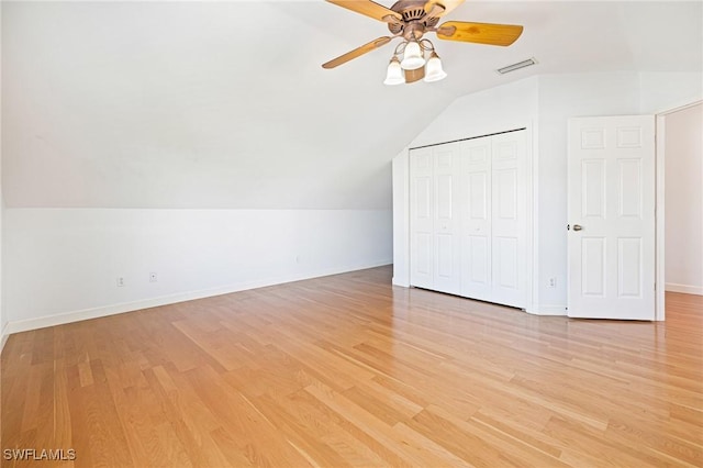 6081 Waterway Bay Dr, Fort Myers, FL 33908 - bonus room with lofted ceiling, visible vents, a ceiling fan, light wood-type flooring, and baseboards