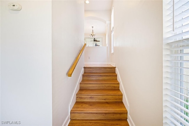 6081 Waterway Bay Dr, Fort Myers, FL 33908 - stairway featuring wood finished floors and baseboards