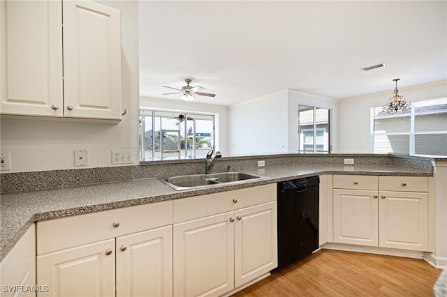 6081 Waterway Bay Dr, Fort Myers, FL 33908 - kitchen featuring light wood finished floors, white cabinets, a sink, visible vents, and dishwasher
