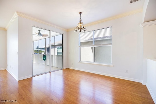 6081 Waterway Bay Dr, Fort Myers, FL 33908 - unfurnished dining area with wood finished floors, baseboards, and ornamental molding