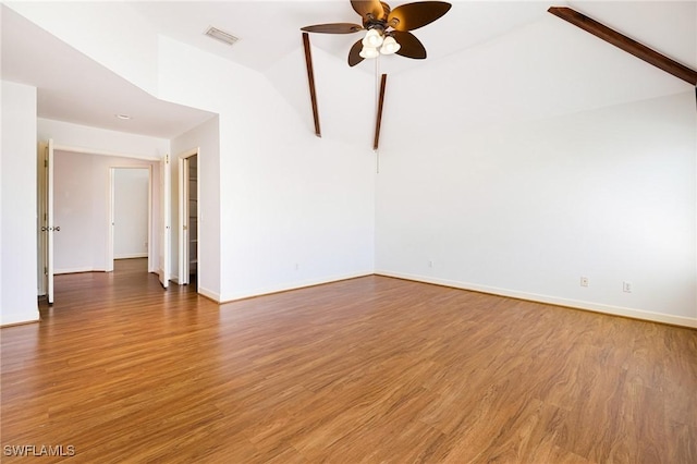 6081 Waterway Bay Dr, Fort Myers, FL 33908 - unfurnished room featuring vaulted ceiling, visible vents, baseboards, wood finished floors, and ceiling fan