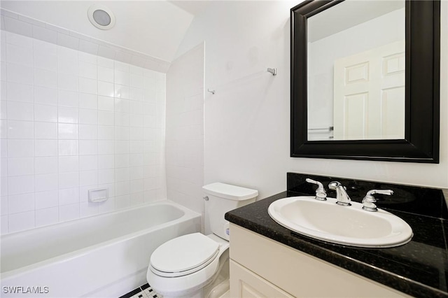 6081 Waterway Bay Dr, Fort Myers, FL 33908 - bathroom with toilet, vanity, vaulted ceiling, and tub / shower combination