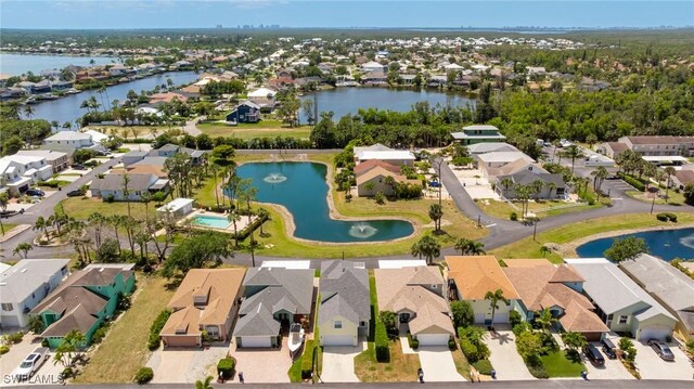 6081 Waterway Bay Dr, Fort Myers, FL 33908 - drone / aerial view featuring a residential view and a water view