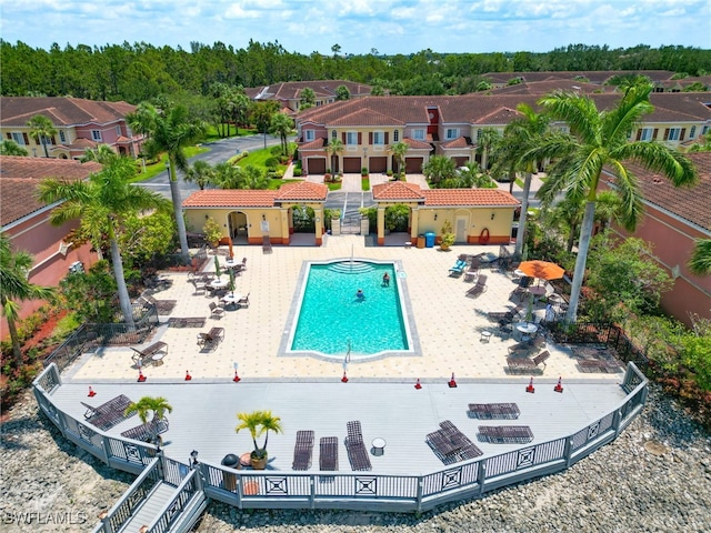 pool with a patio area