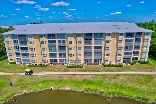 view of building exterior featuring a water view