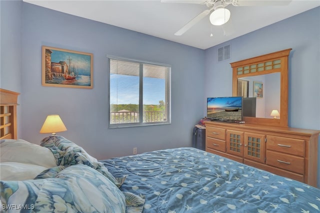 bedroom featuring visible vents and a ceiling fan