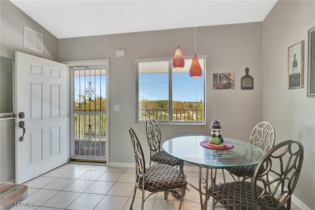 dining room featuring visible vents, baseboards, and light tile patterned flooring