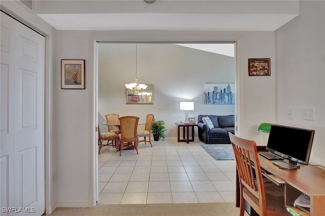 dining room featuring light tile patterned floors, a notable chandelier, and baseboards