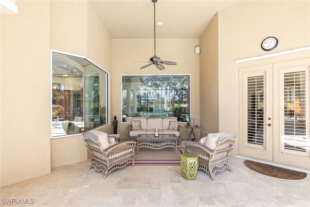 view of patio / terrace featuring french doors, a ceiling fan, and outdoor lounge area