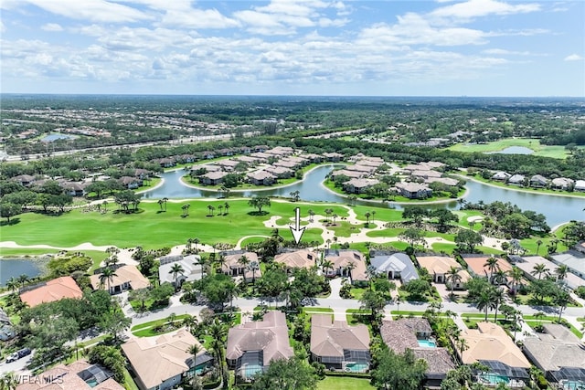 aerial view with a water view, a residential view, and golf course view