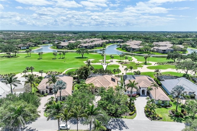 aerial view featuring a water view, golf course view, and a residential view