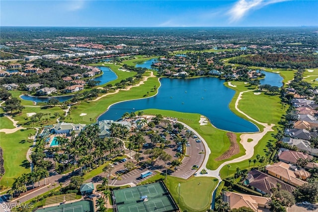 birds eye view of property featuring golf course view, a residential view, and a water view