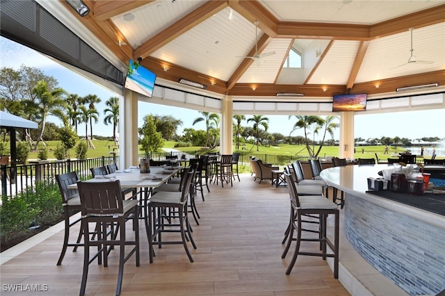 view of patio with a gazebo, outdoor dining space, and outdoor dry bar