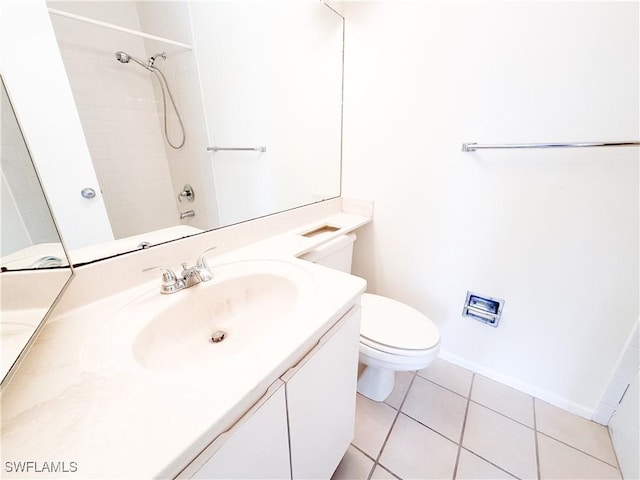 full bathroom featuring vanity, baseboards, tile patterned floors, and toilet