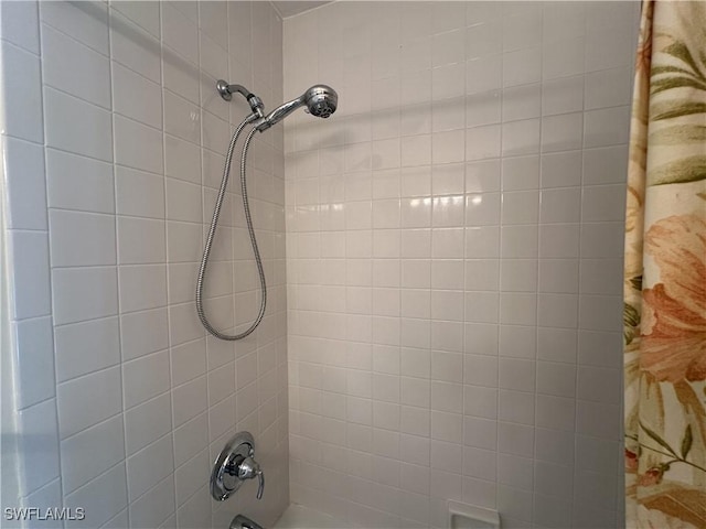 room details with shower / bath combination with curtain