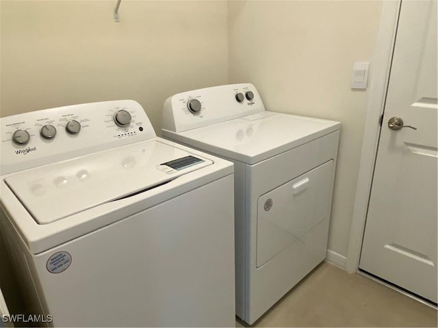 211 NE 20th St, Cape Coral, FL 33909 - laundry area featuring washing machine and dryer and laundry area