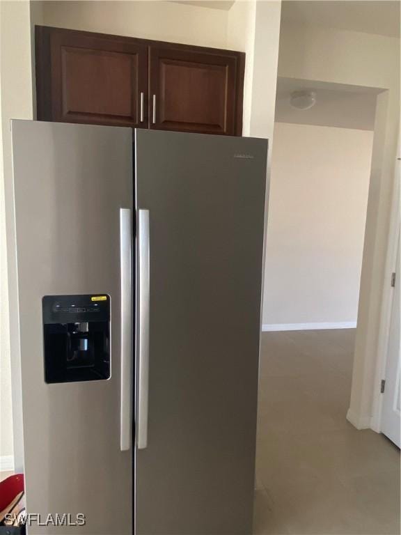 211 NE 20th St, Cape Coral, FL 33909 - interior details featuring stainless steel fridge with ice dispenser