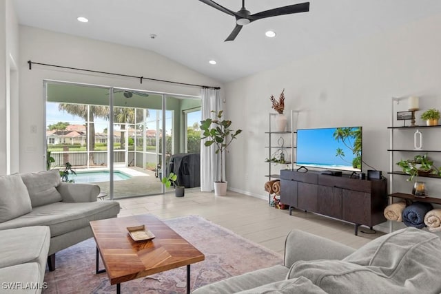 living area featuring a ceiling fan, lofted ceiling, wood finished floors, recessed lighting, and baseboards