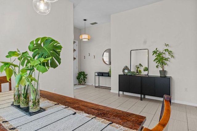 foyer entrance with baseboards
