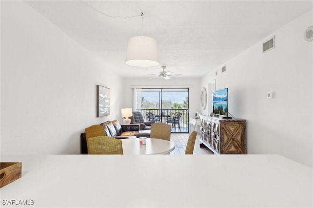 dining area with ceiling fan