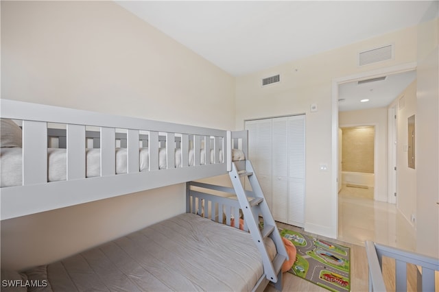 15901 Royal Pointe Ln Unit 404, Fort Myers, FL 33908 - bedroom featuring visible vents and a closet