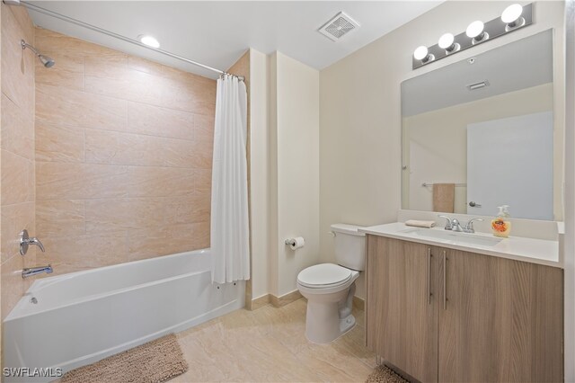 15901 Royal Pointe Ln Unit 404, Fort Myers, FL 33908 - bathroom with toilet, shower / bathtub combination with curtain, vanity, and visible vents