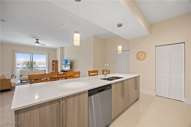 15901 Royal Pointe Ln Unit 404, Fort Myers, FL 33908 - kitchen with open floor plan, light countertops, ceiling fan, dishwasher, and a sink