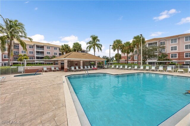 15901 Royal Pointe Ln Unit 404, Fort Myers, FL 33908 - pool with a patio, a gazebo, and fence